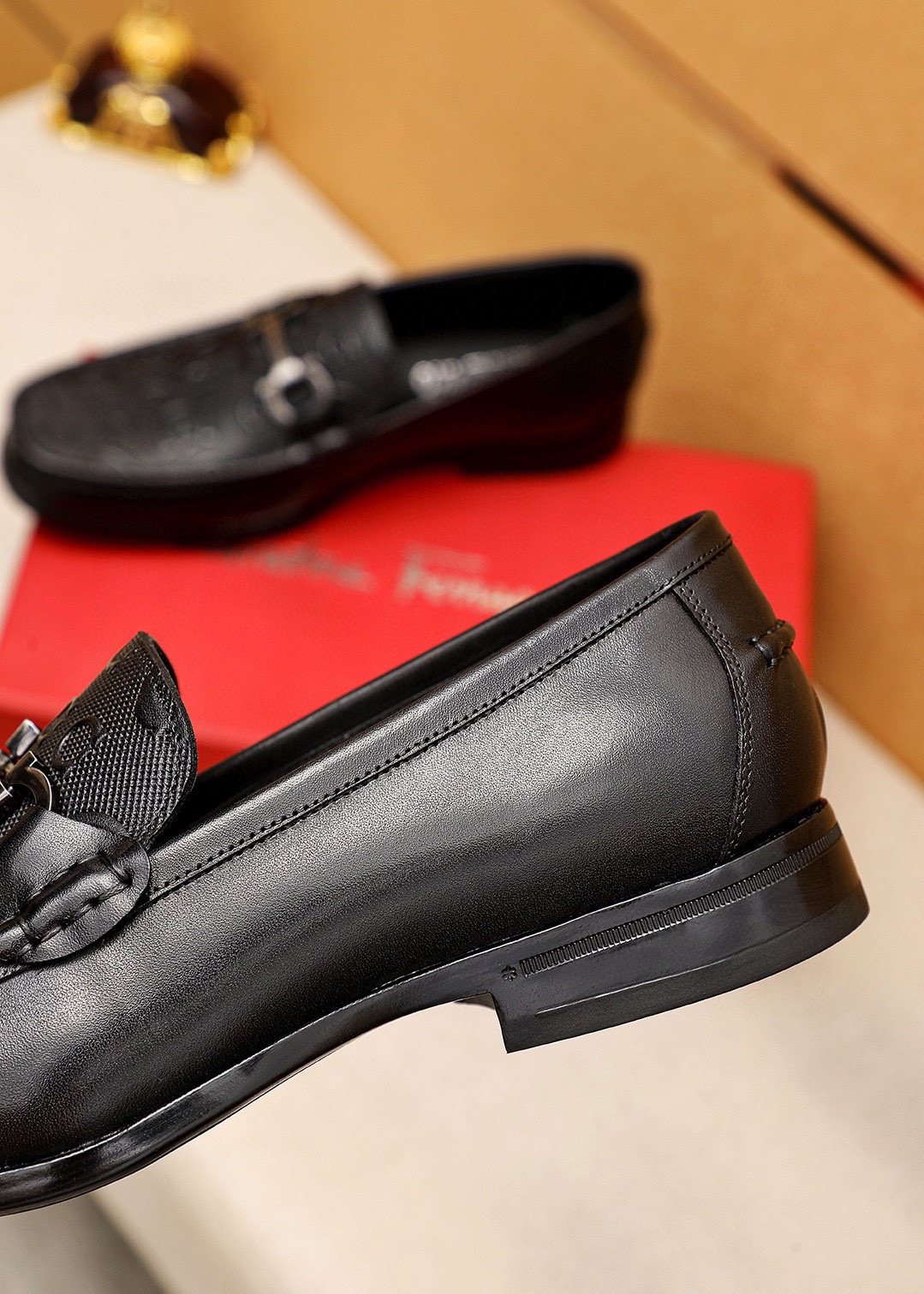 Ferragamo Men's Black Embossed Buckle Loafers - Metal Buckle Detail